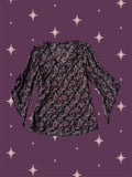Blusa arabescos